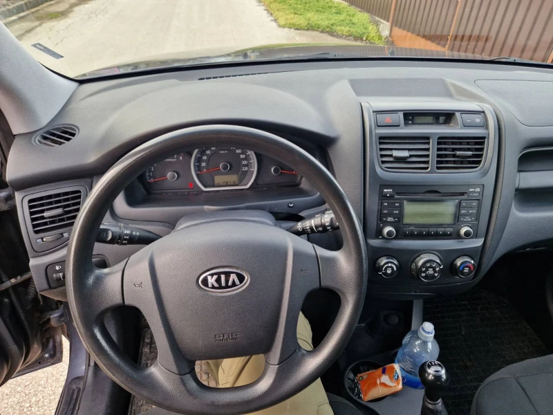 Kia Sportage Facelift 2.0 i, снимка 7 - Автомобили и джипове - 53333901