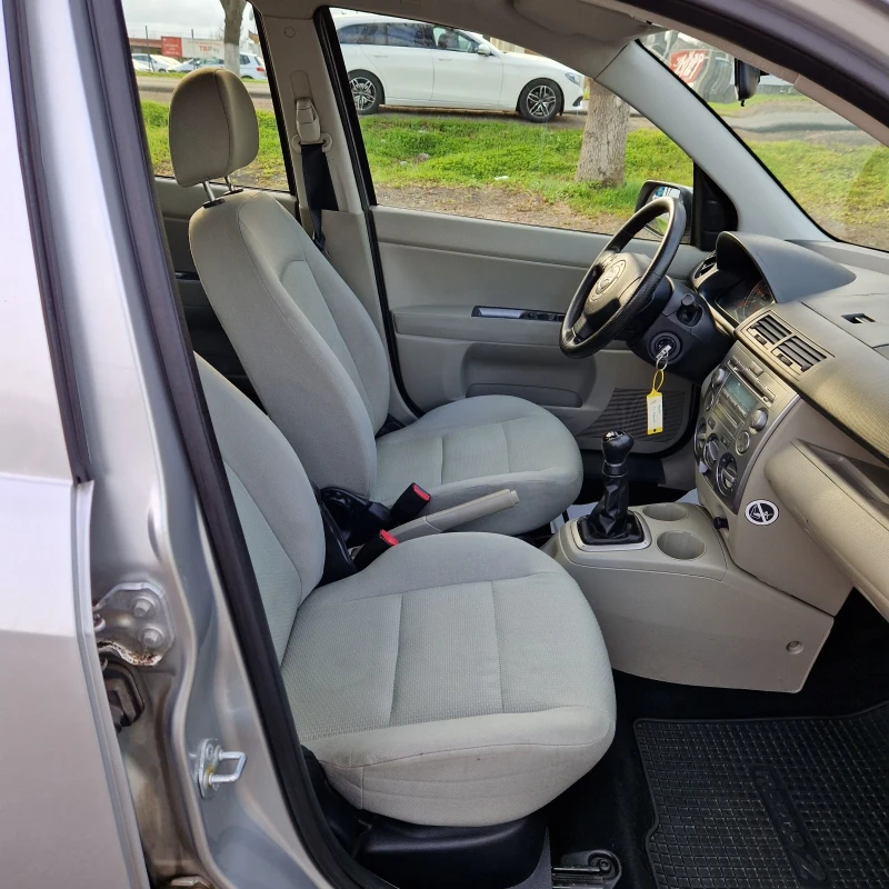 Mazda 2 1.3i Face, снимка 12 - Автомобили и джипове - 52665491