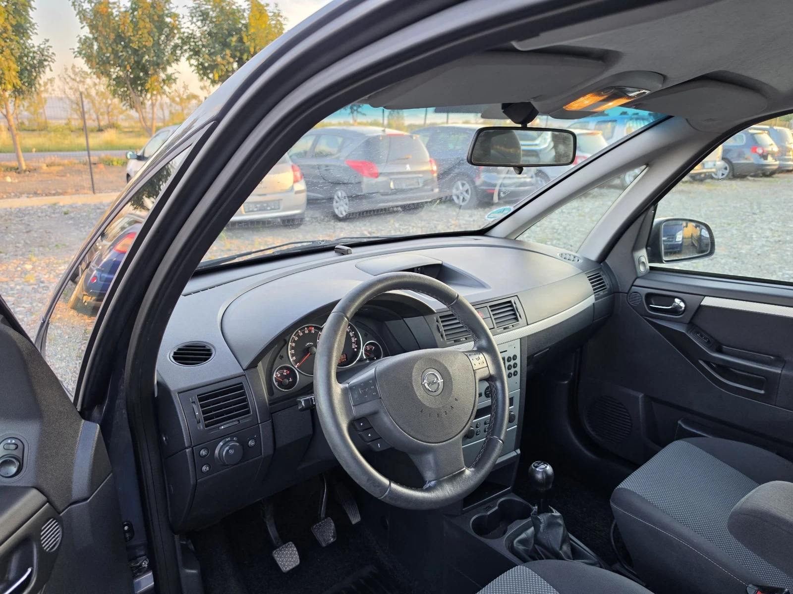 Opel Meriva 1.6i facelift , снимка 10 - Автомобили и джипове - 54397468