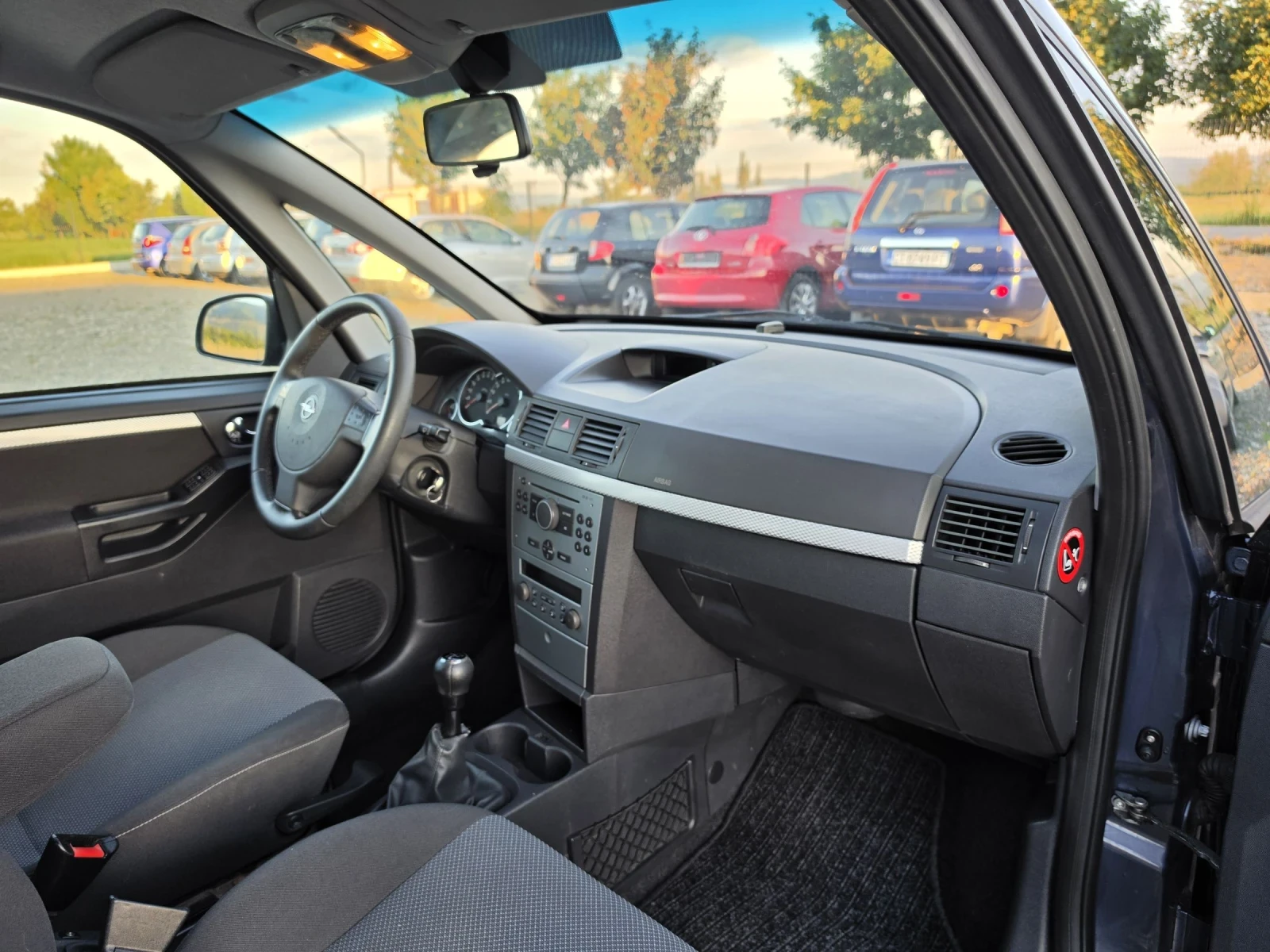 Opel Meriva 1.6i facelift , снимка 13 - Автомобили и джипове - 54397468
