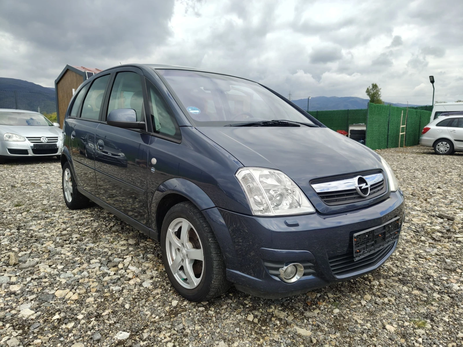 Opel Meriva 1.6i facelift , снимка 8 - Автомобили и джипове - 54397468