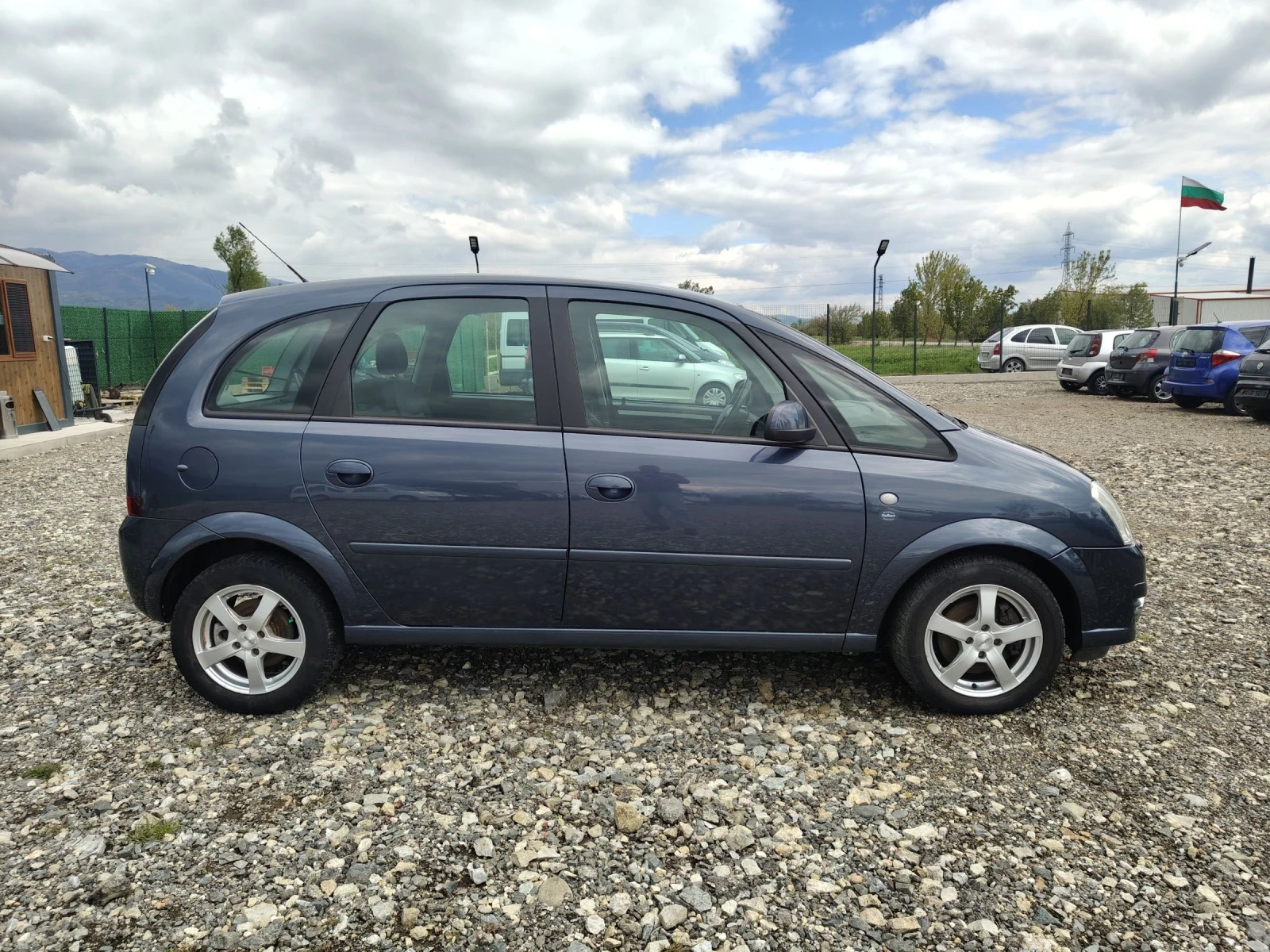 Opel Meriva 1.6i facelift , снимка 7 - Автомобили и джипове - 54397468