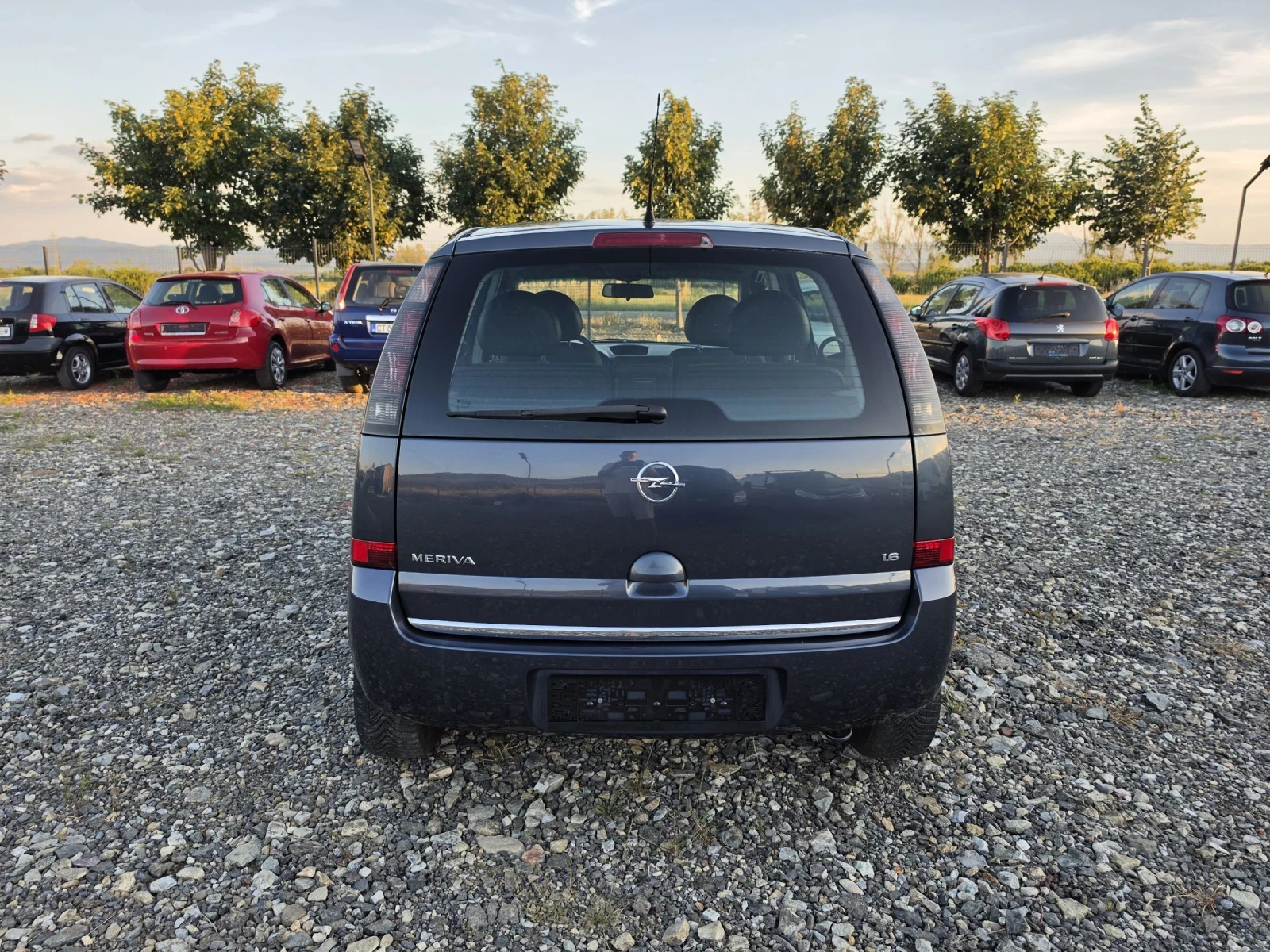Opel Meriva 1.6i facelift , снимка 5 - Автомобили и джипове - 54397468