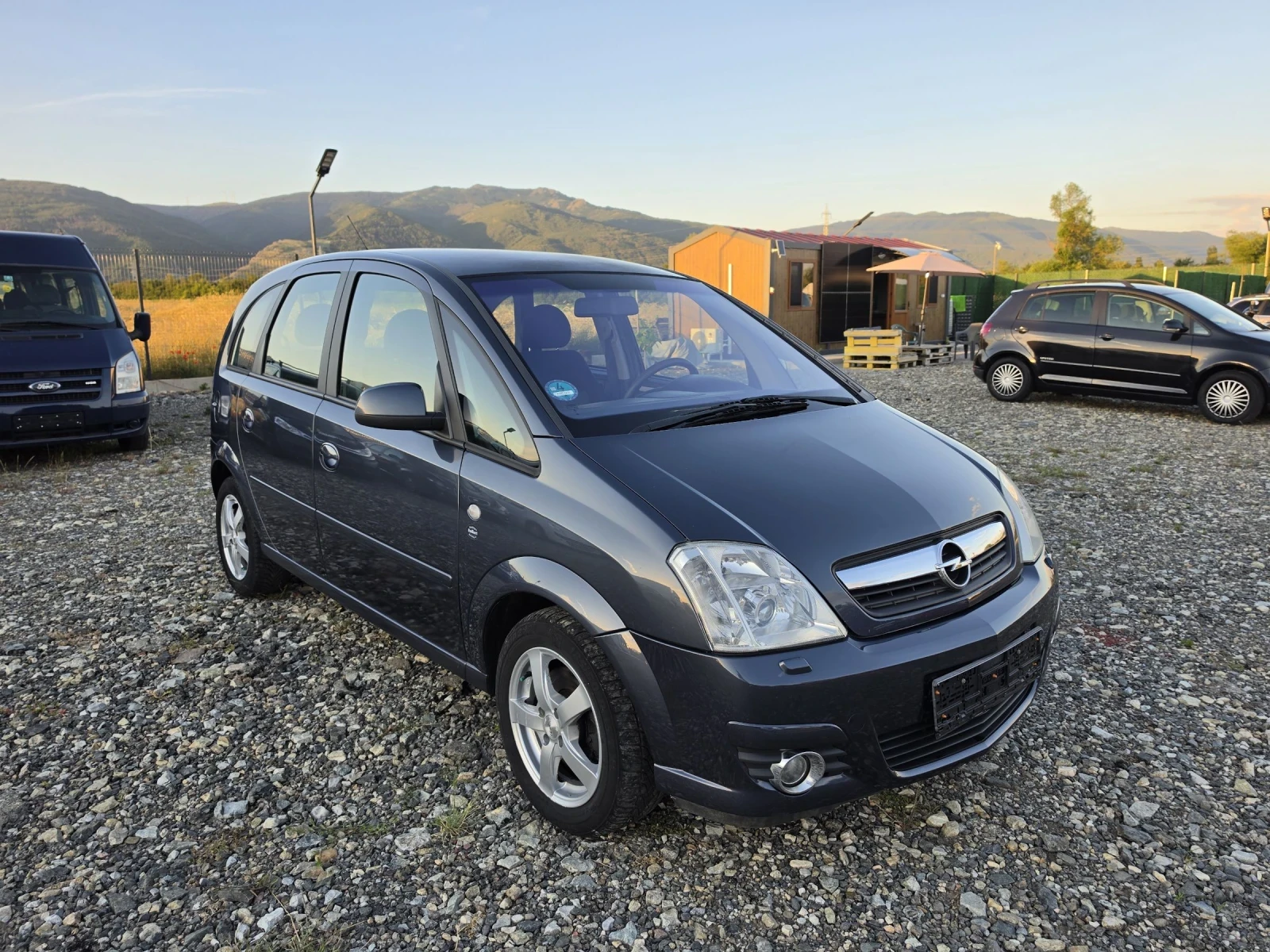 Opel Meriva 1.6i facelift , снимка 8 - Автомобили и джипове - 54397468