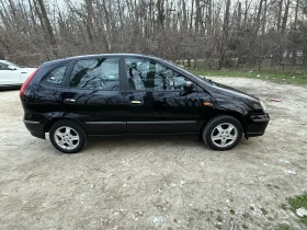 Nissan Almera tino, снимка 9