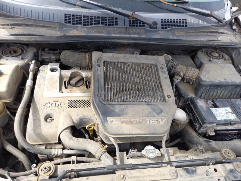 Kia Carens 2.0crdi, снимка 5 - Автомобили и джипове - 52884712