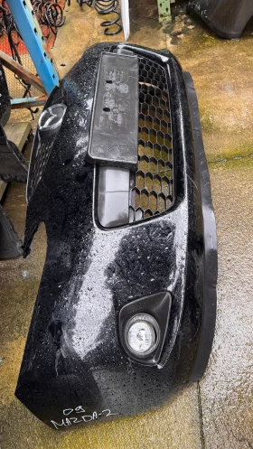Предна броня за Mazda 2 2009, снимка 2 - Части - 52997223