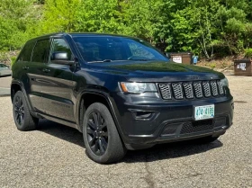 ������ Jeep Cherokee