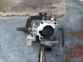Дроселова клапа за Сузуки Балено 1.3 бензин. 98 год. G13B ., снимка 4 - Части - 53277955