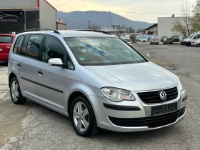 VW Touran 1.9 TDI 105ps 6скорости  Facelift - 7500 лв. / 3834.69 € - 48189459 4