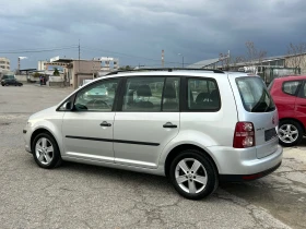 VW Touran 1.9 TDI 105ps 6скорости  Facelift - 7500 лв. / 3834.69 € - 48189459 8