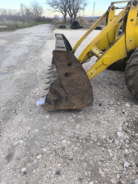 Багер Komatsu WB93S, снимка 16