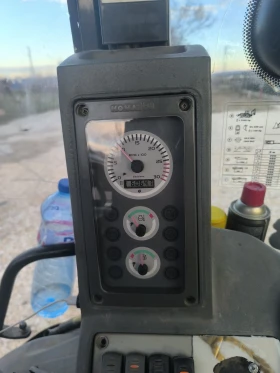 Багер Komatsu WB93S, снимка 13