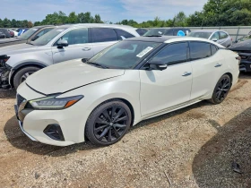 ������ Nissan Maxima