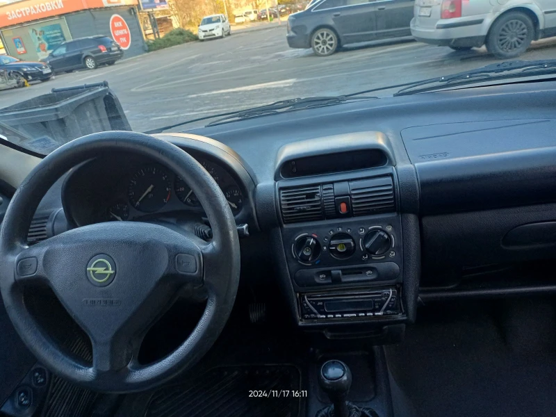 Opel Corsa 1.2 16V, снимка 9 - Автомобили и джипове - 48050932