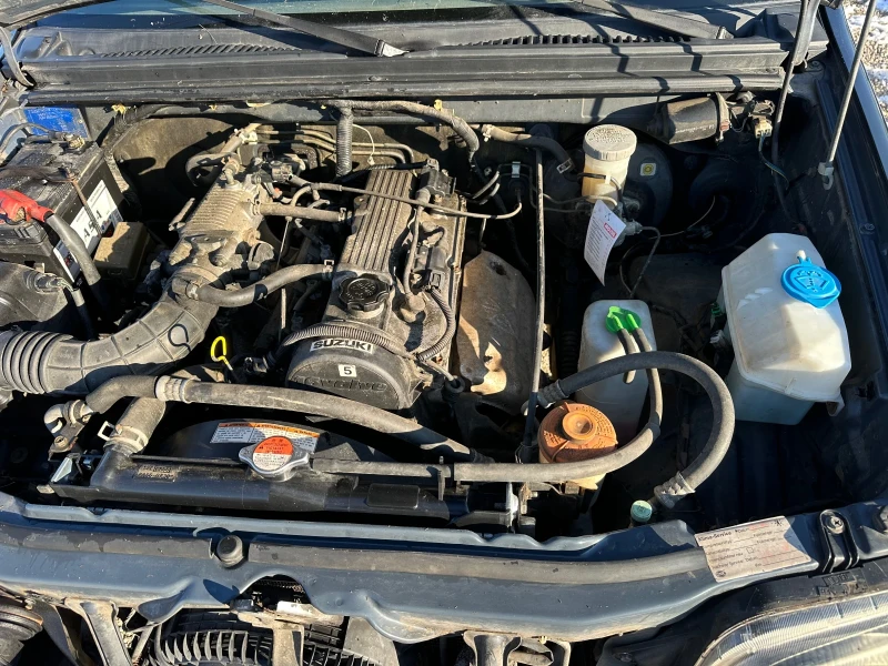 Suzuki Jimny 1.3 I  4WD KLIMA, снимка 13 - Автомобили и джипове - 52913075