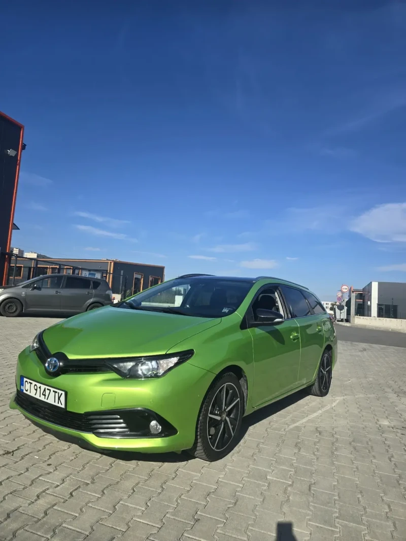 Toyota Auris 1.8 HYBRID 99 k. FULL TOPP, снимка 1 - Автомобили и джипове - 47344155