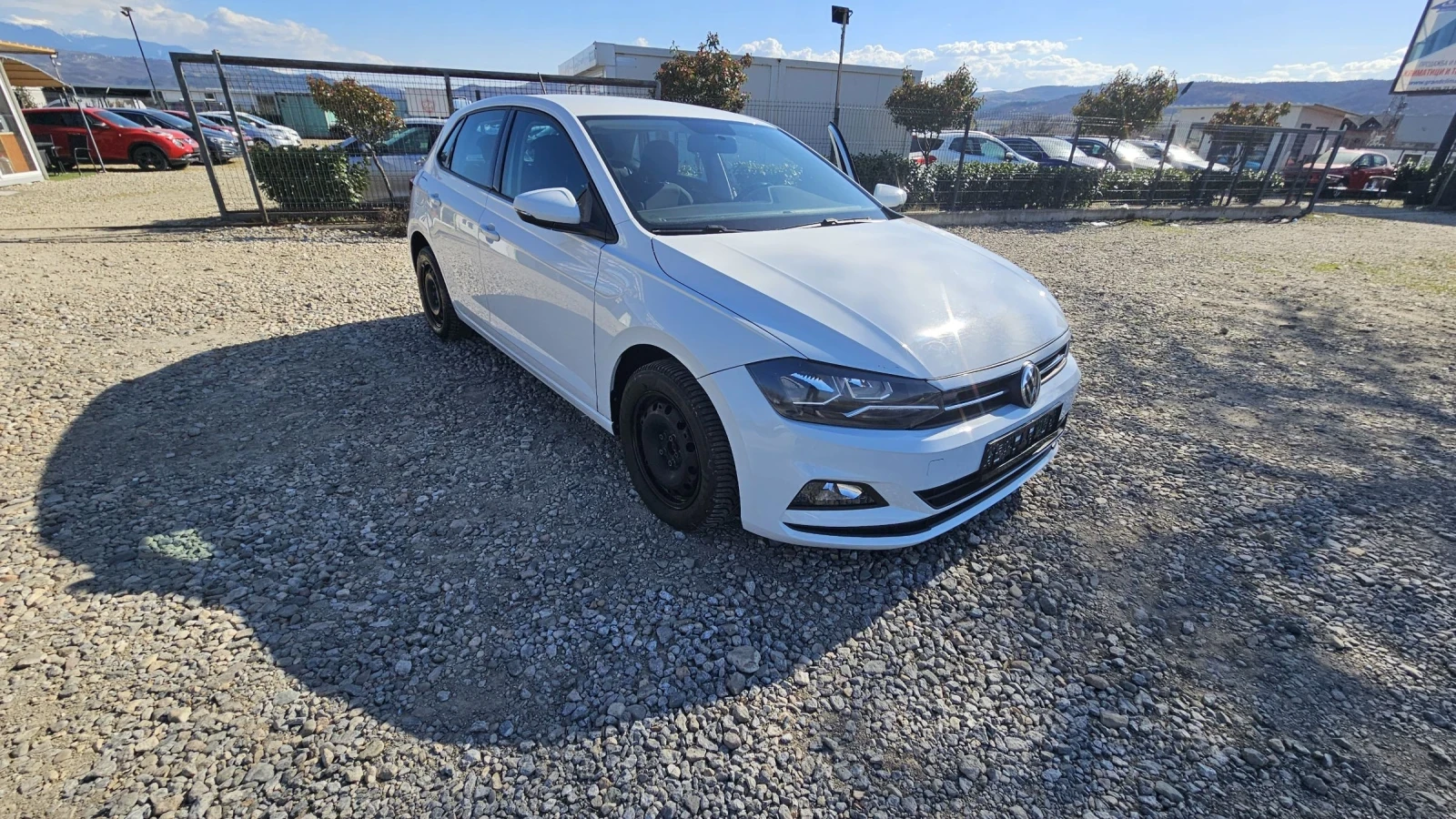 VW Polo 1.0i, снимка 12 - Автомобили и джипове - 54962254
