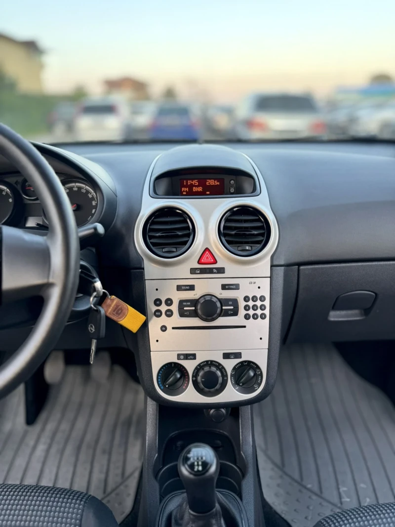 Opel Corsa 1.2 i, снимка 11 - Автомобили и джипове - 51276453