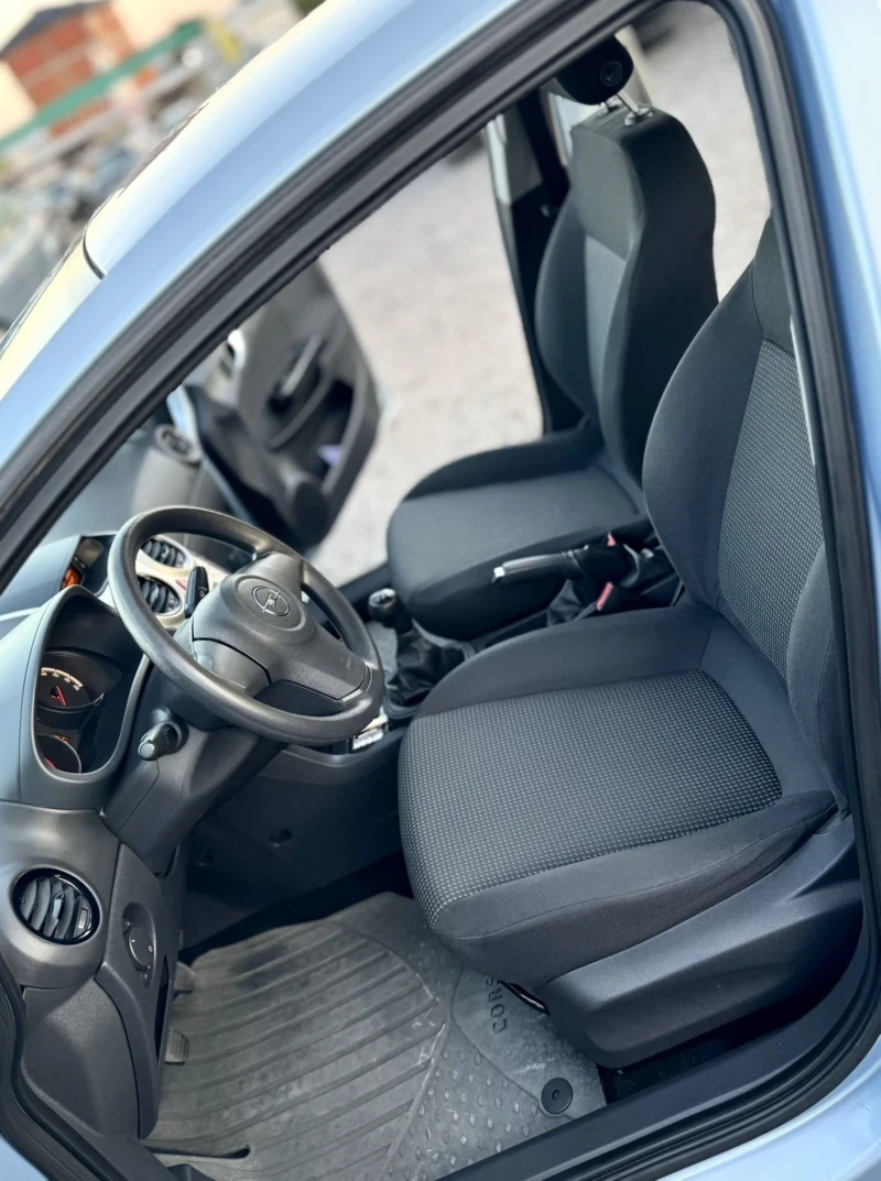 Opel Corsa 1.2 i, снимка 12 - Автомобили и джипове - 51276453