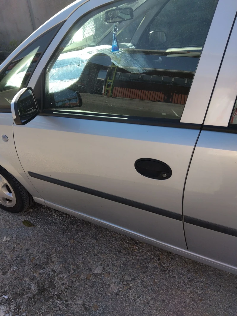 Opel Meriva 1.6 , снимка 9 - Автомобили и джипове - 52918447