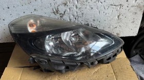      a Renault Clio - 26010756