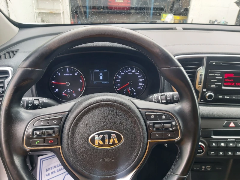 Kia Sportage 1.7 crdi, снимка 12 - Автомобили и джипове - 53368550
