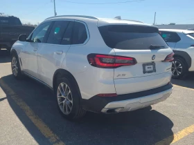 BMW X5 * xDrive40i * ПОДГРЕВИ * ПАНО * 2 КЛЮЧА * CARFAX *, снимка 4