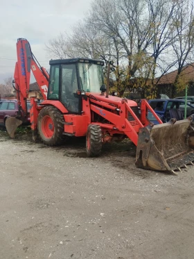 Багер Komatsu  - изображение 1