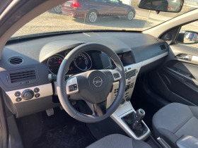 Opel Astra 1.7 CDTI, снимка 11 - Автомобили и джипове - 44430365