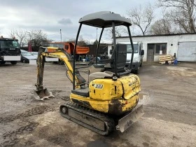      New Holland E 18