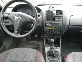 Mazda 323, снимка 11