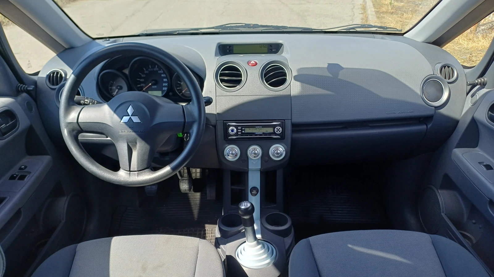 Mitsubishi Colt  - изображение 7