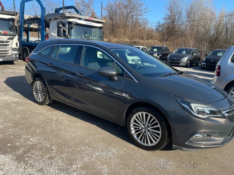 Opel Astra 1.6 CRDI , COSMO, KEYLESS, КОЖА , ШИБИДАХ, снимка 6 - Автомобили и джипове - 49376342