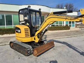Багер Caterpillar 302.7 DCR, снимка 10