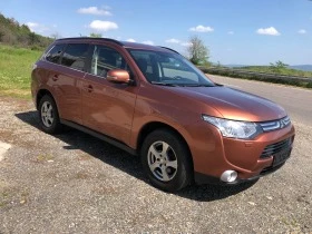 Mitsubishi Outlander 2.2DI-D 4WD EURO-5B 201000km.100%7 Места, снимка 12