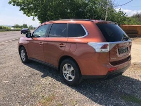 Mitsubishi Outlander 2.2DI-D 4WD EURO-5B 201000km.100%7 Места, снимка 5