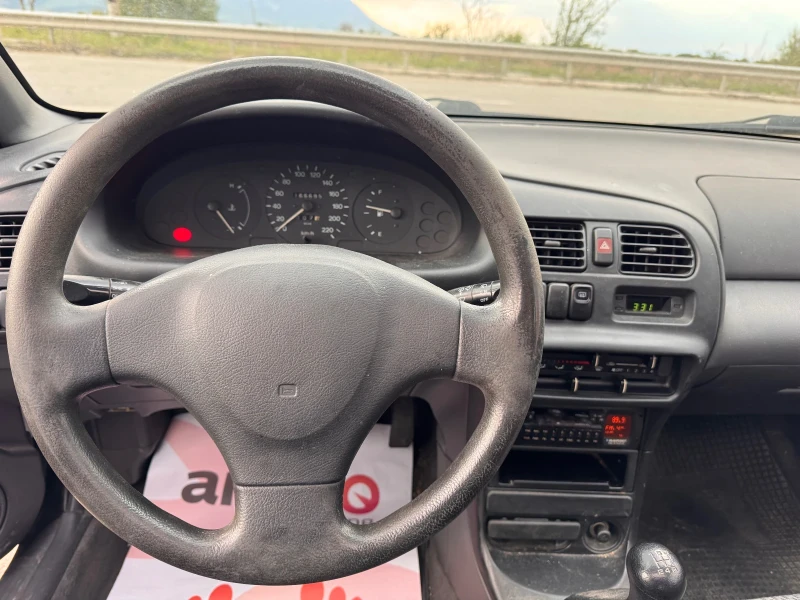 Mazda 323 1.3i, снимка 6 - Автомобили и джипове - 49849068