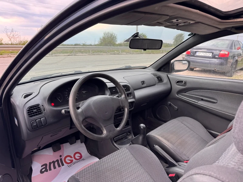 Mazda 323 1.3i, снимка 5 - Автомобили и джипове - 49849068