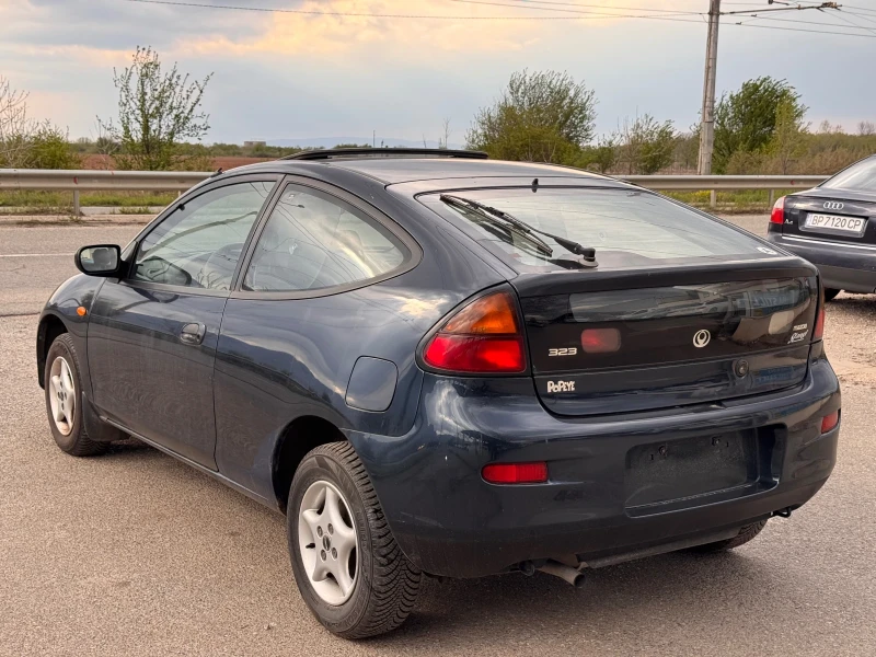 Mazda 323 1.3i, снимка 4 - Автомобили и джипове - 49849068