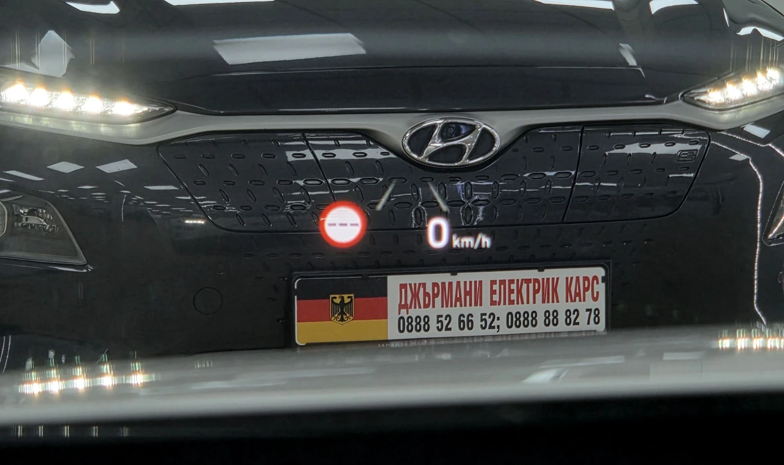 Hyundai Kona 64KWh/Premium/SOH100/ СЕРВИЗНА КНИЖКА, снимка 14 - Автомобили и джипове - 53929642