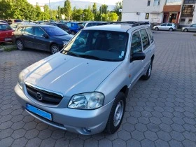 Mazda Tribute  - изображение 1