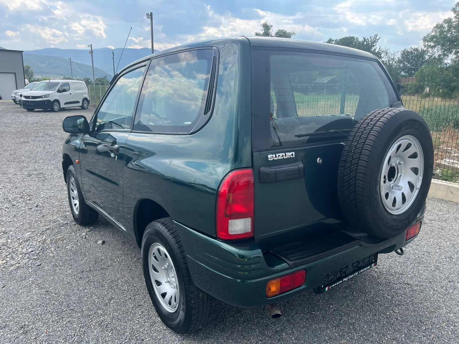 Suzuki Grand vitara 1.6 i, снимка 6 - Автомобили и джипове - 55359647
