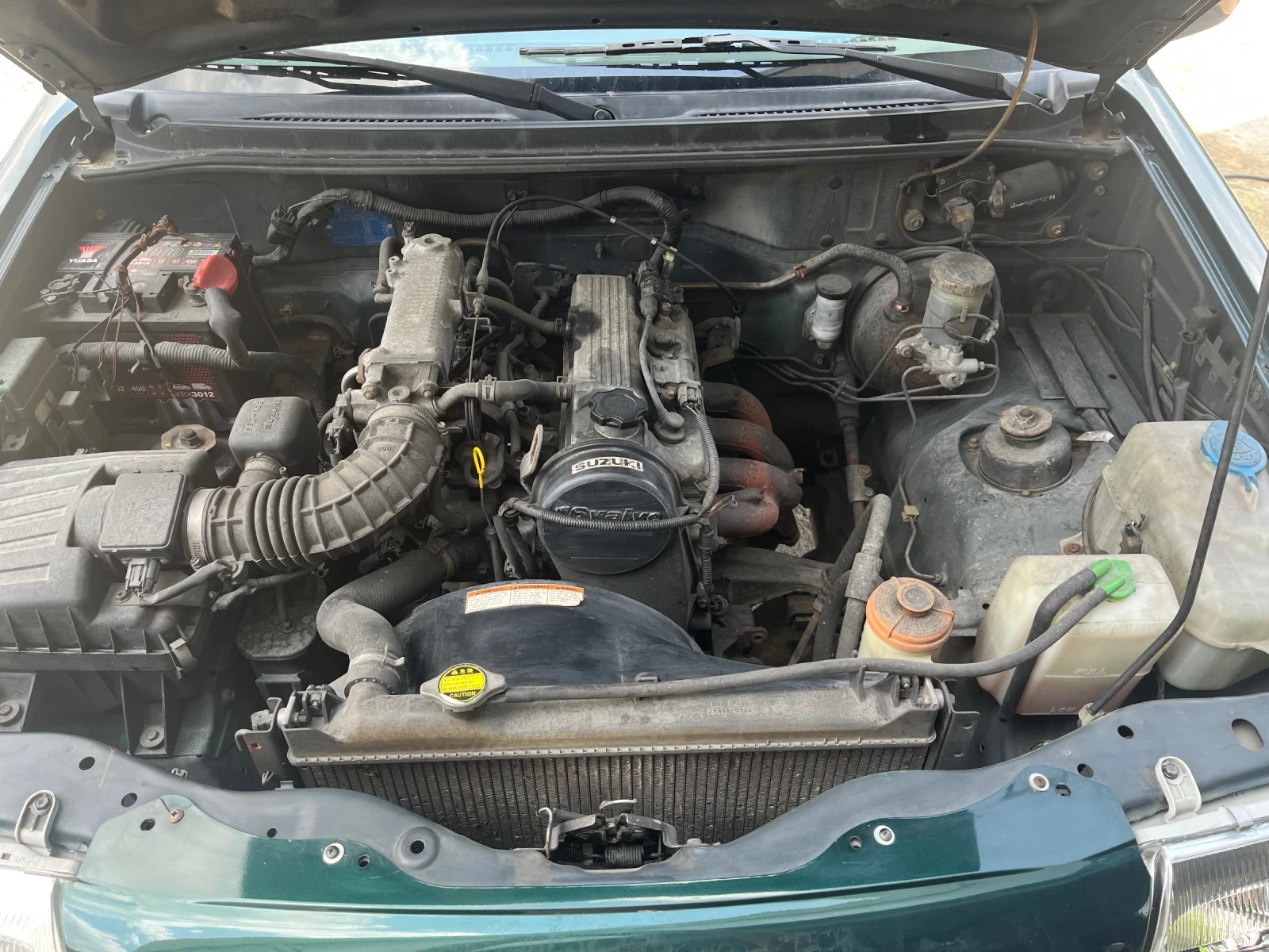 Suzuki Grand vitara 1.6 i, снимка 15 - Автомобили и джипове - 55359647