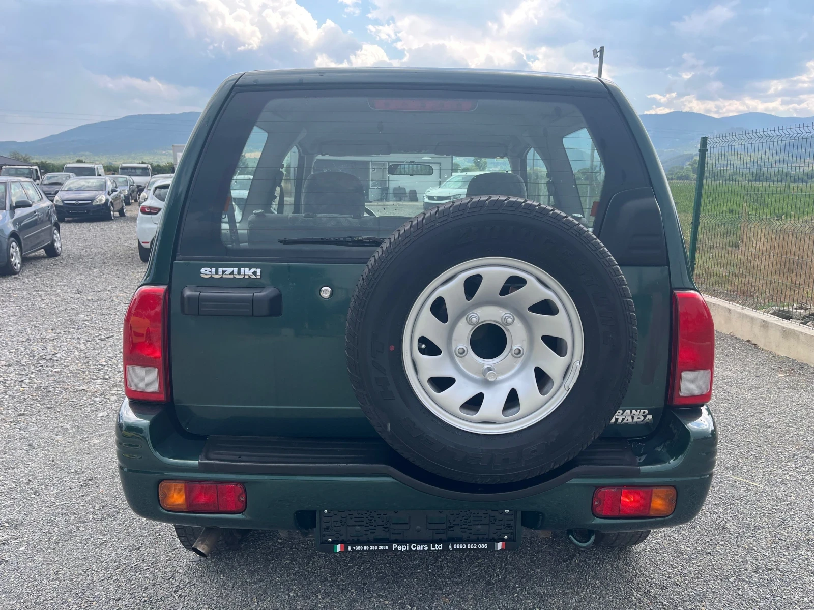 Suzuki Grand vitara 1.6 i, снимка 5 - Автомобили и джипове - 55359647