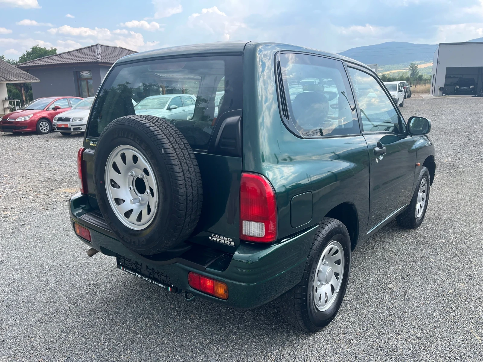 Suzuki Grand vitara 1.6 i, снимка 4 - Автомобили и джипове - 55359647