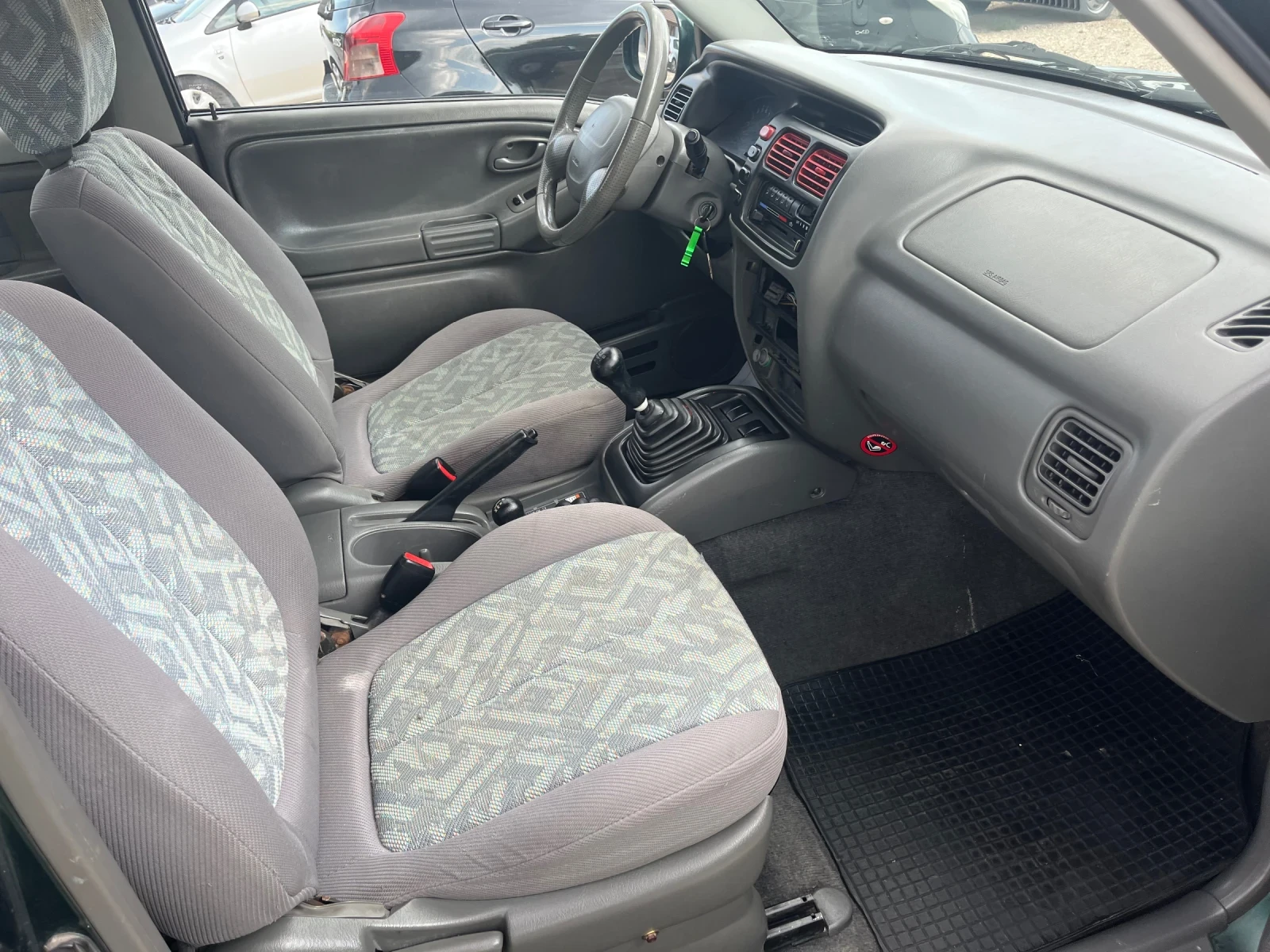 Suzuki Grand vitara 1.6 i, снимка 11 - Автомобили и джипове - 55359647