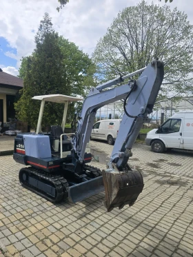 Багер Kubota КХ 026