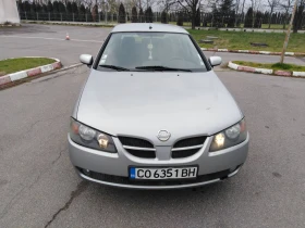 ������ Nissan Almera