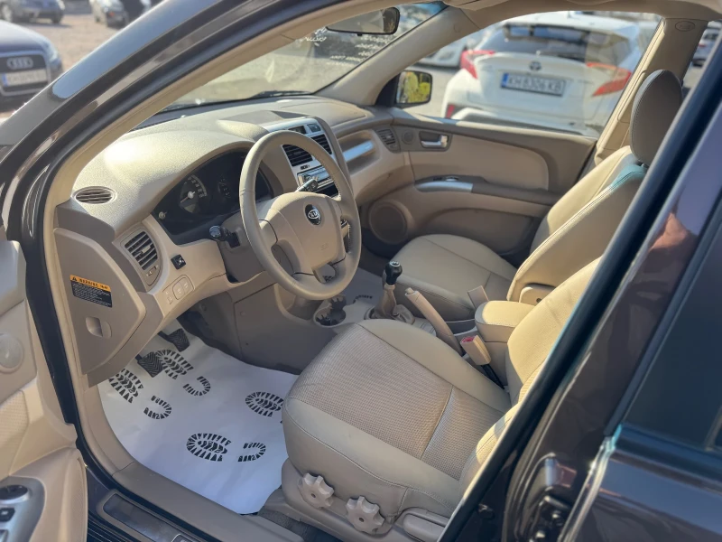Kia Sportage 2.0i GAZ EXCLUSIVE  4x4, снимка 3 - Автомобили и джипове - 52997866